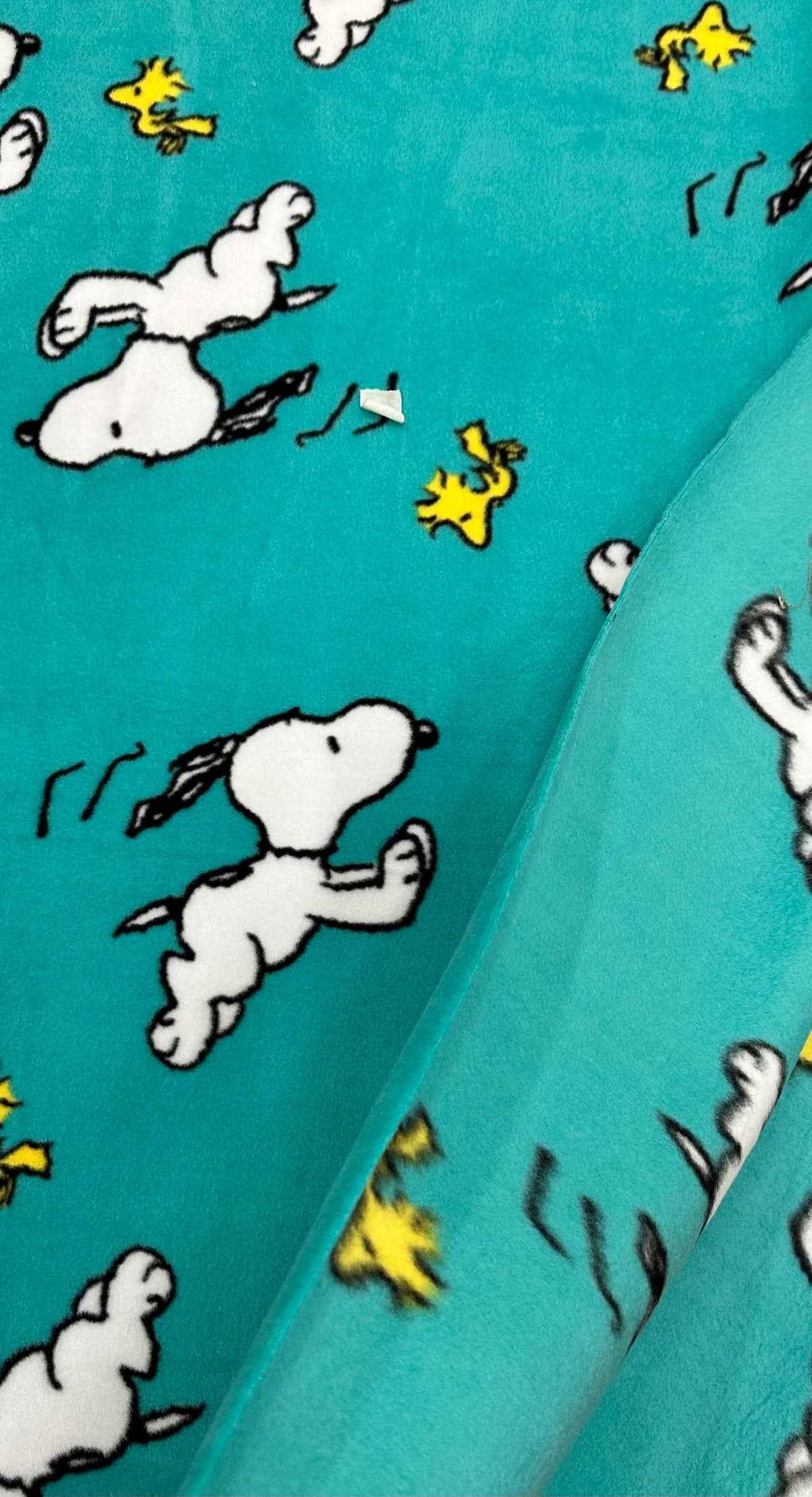 Snoopy and Woodstock Fleece Fabric – Teal Blue Peanuts Cartoon Print – Soft Anti-Pill Fleece Perfect for sewing blankets, jackets