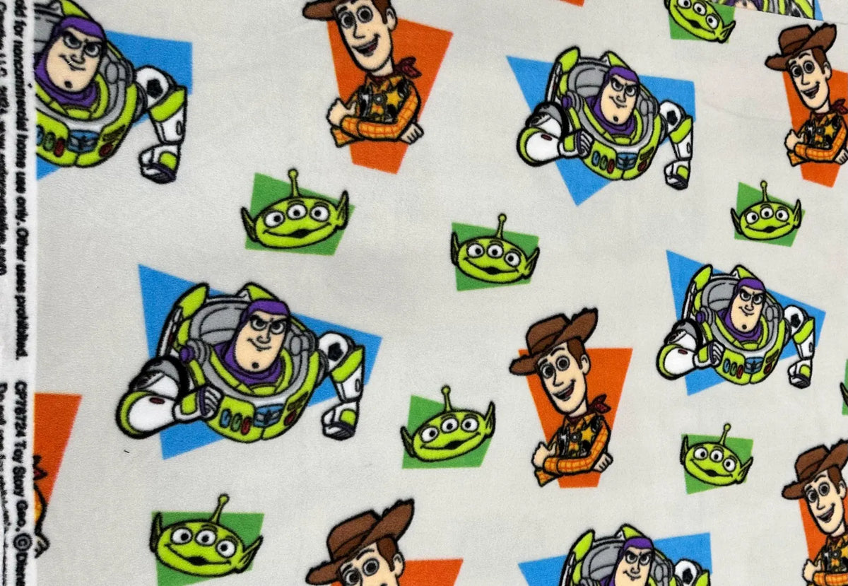 Toy Story Fleece Fabric Sold by the Yard – Woody, Buzz Lightyear & Alien Print – Soft Disney Pixar Material. Perfect for sewing blankets, jackets