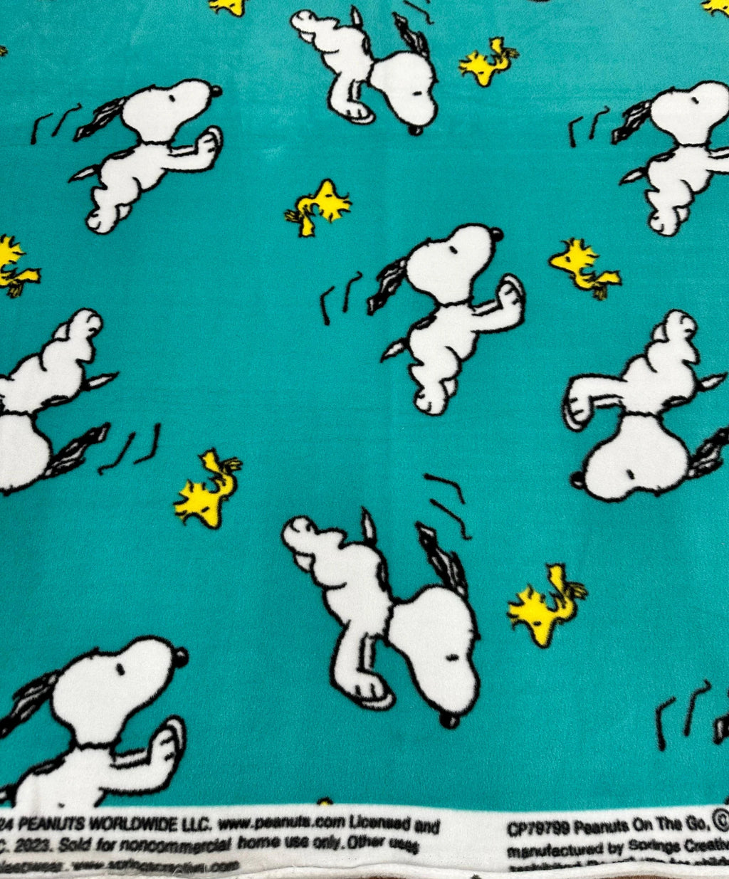 Snoopy and Woodstock Fleece Fabric – Teal Blue Peanuts Cartoon Print – Soft Anti-Pill Fleece Perfect for sewing blankets, jackets