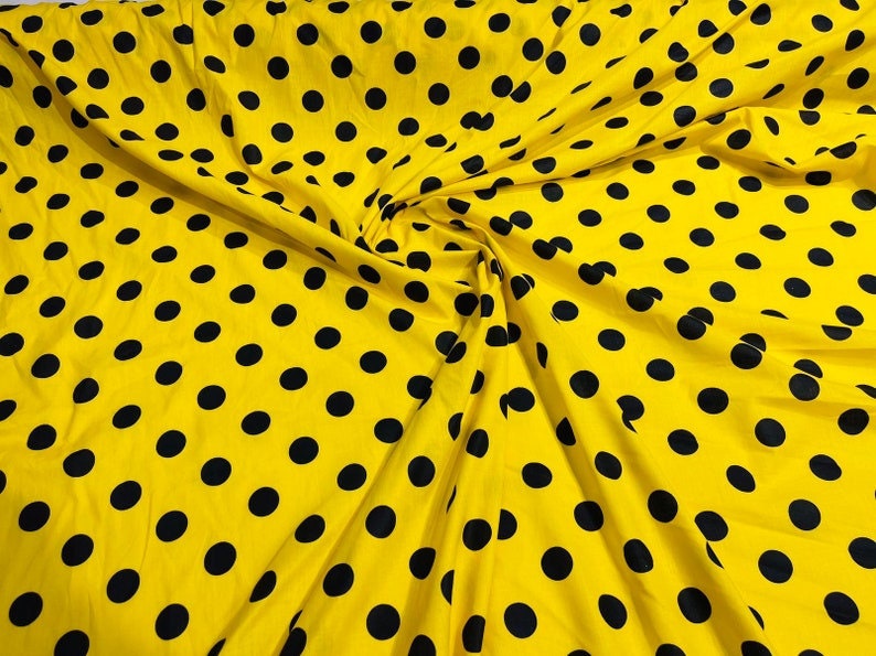 Premium 1 inch Polka Dot Poly Cotton Fabric Sold By The Yard. Black on Yellow