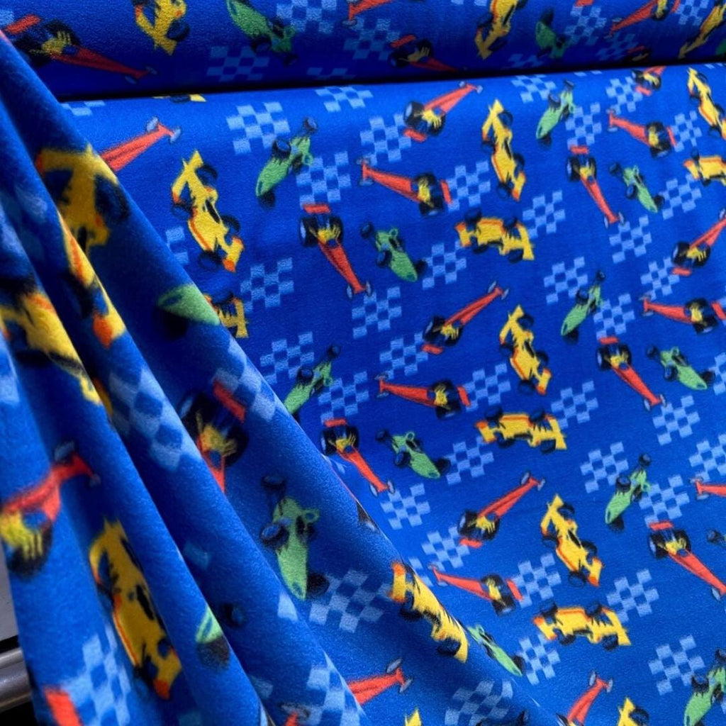 Race Cars Royal Blue Print - Anti Pill Theme Fleece Fabric, 60” Inches Wide – Sold By The Yard